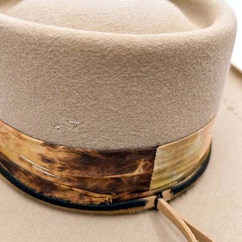 stylish layering of black and natural suedes, up close<span class='visuallyhidden'>; 323-404-2959 for shop help.</span>
